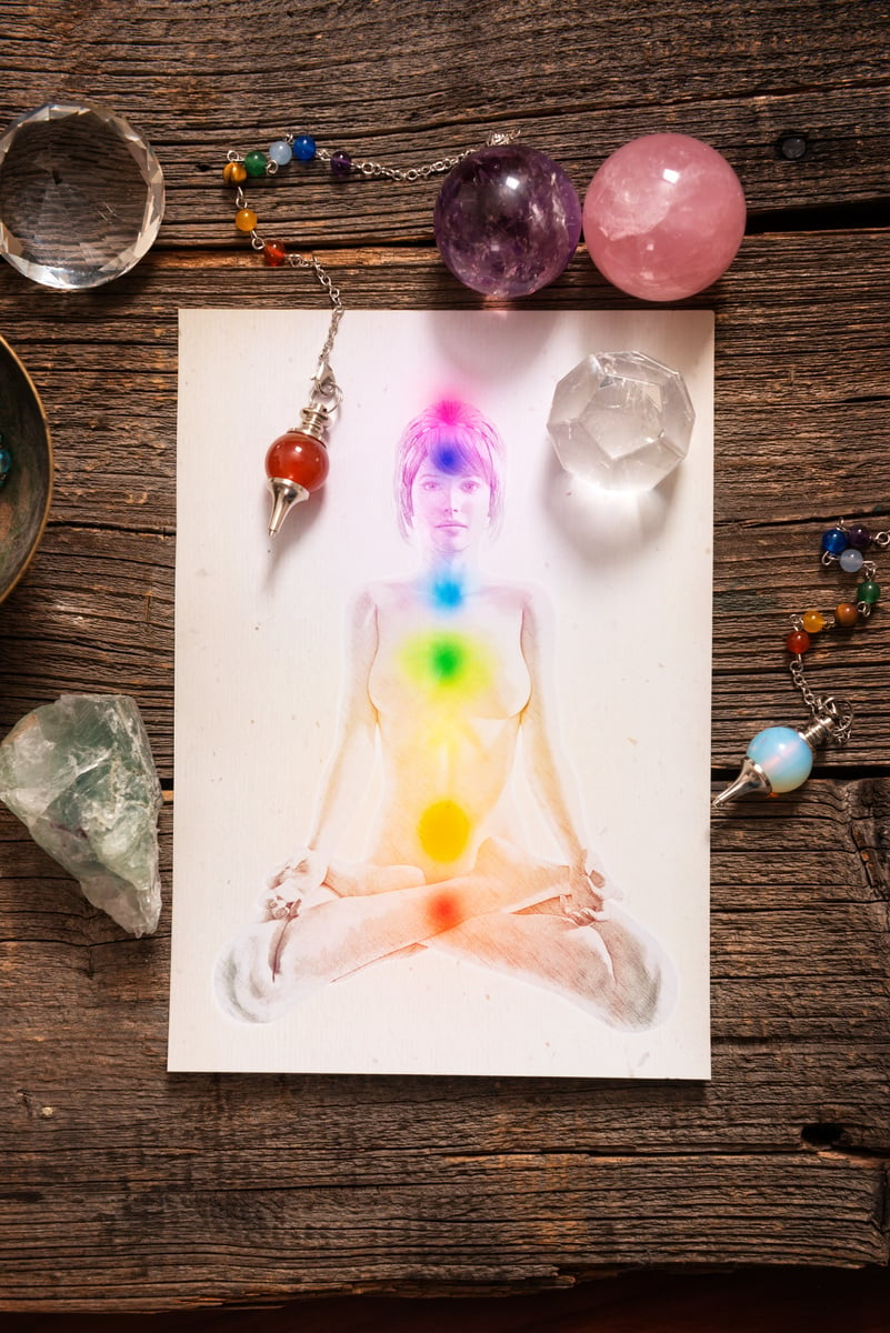 Chakras over a human body